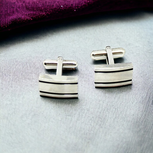 Μανικετόκουμπα in corde ριγέ